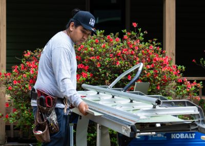 employee using machinery on site